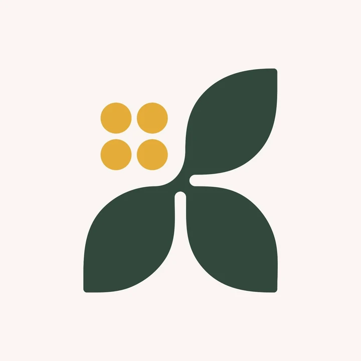 Kohomba leaf monogram in deep green and mustard on cream